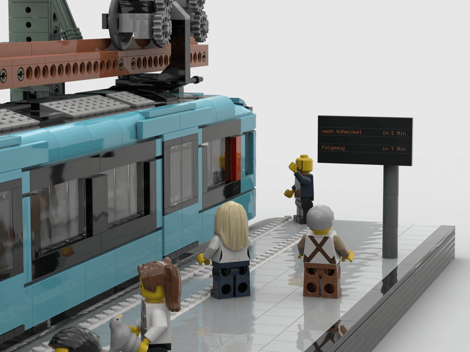 Nahaufnahme des  Schwebebahnmodells mit Bahnsteig und Schaffner