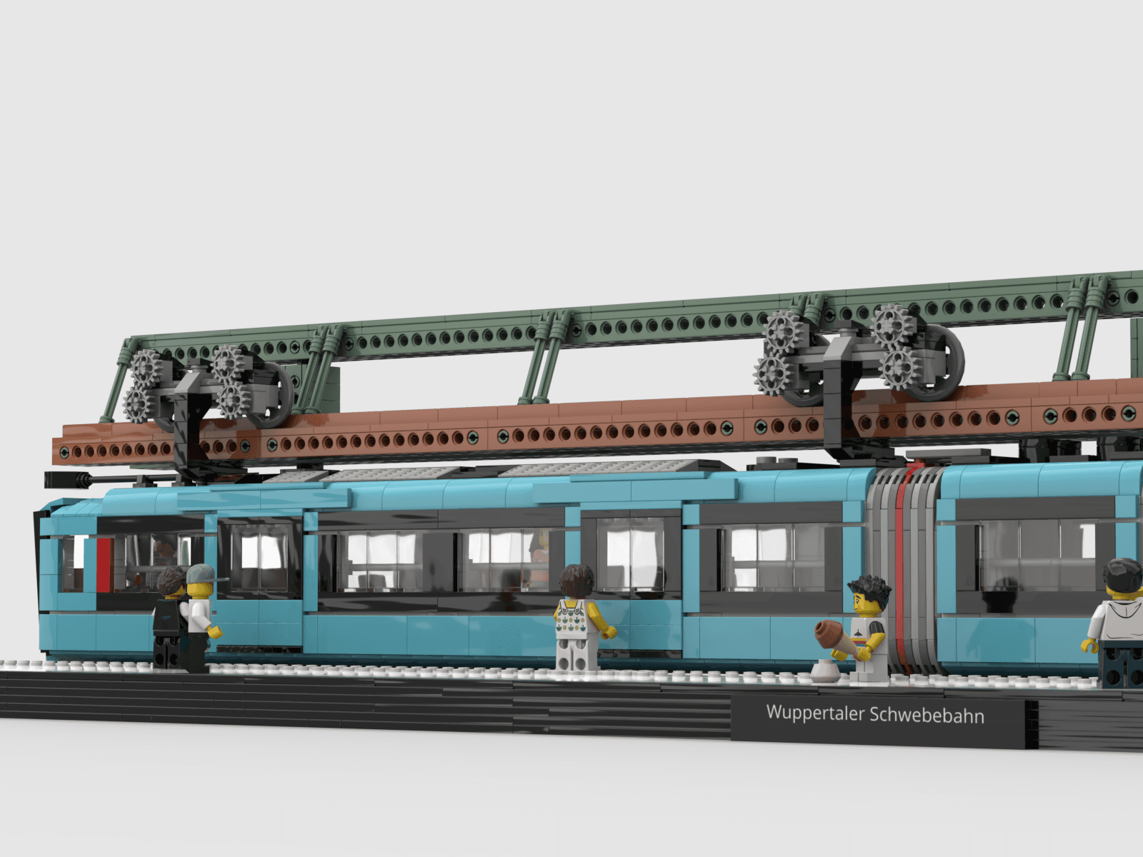 Seitenansicht des Schwebebahnmodells mit Figuren auf dem Bahnsteig